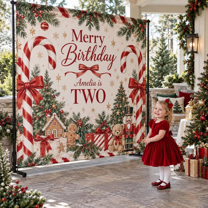 Merry Birthday second birthday backdrop with candy canes and gingerbread houses, shown beside a child.