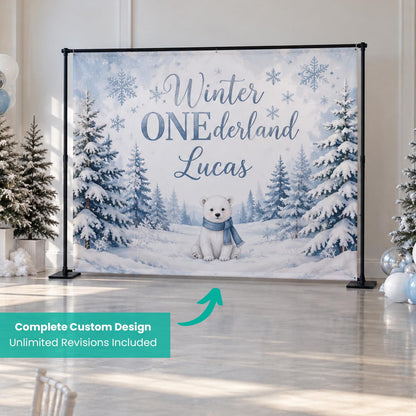 Blue Winter ONEderland first birthday backdrop with snowy trees and a small winter animal.