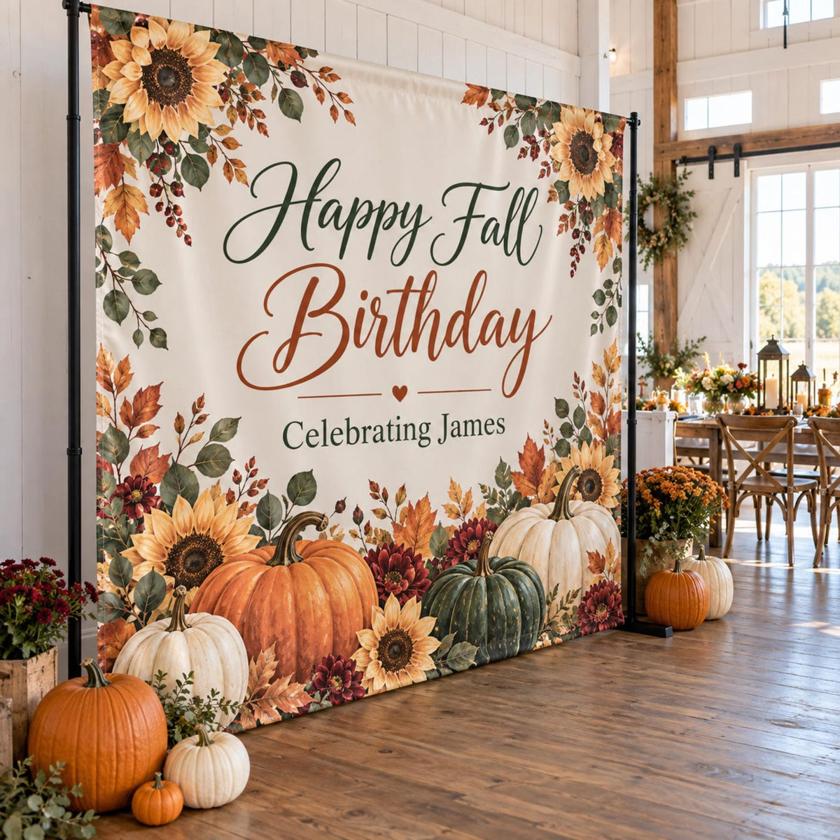 Happy Fall Birthday backdrop with sunflowers, pumpkins and personalized name in an event room.