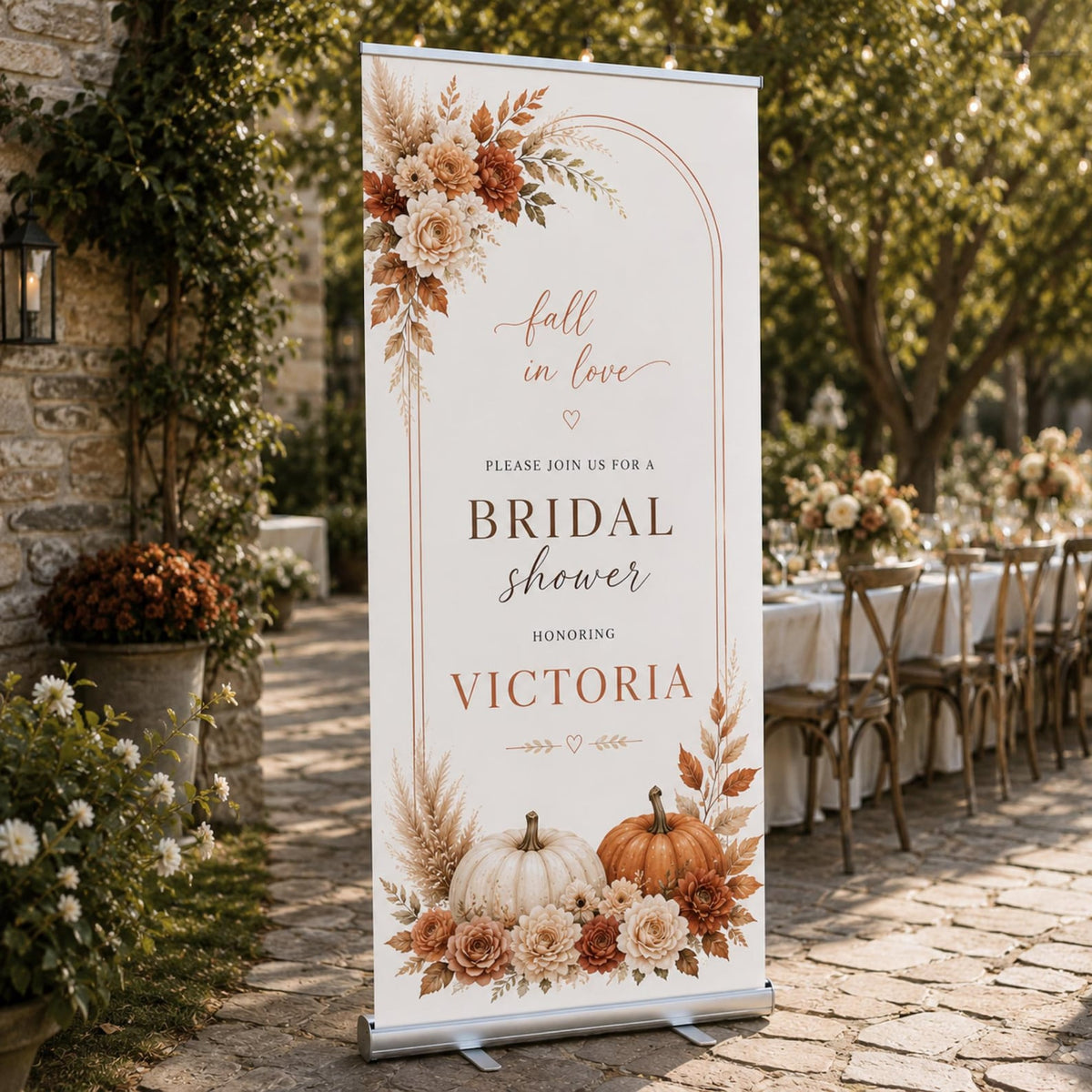 Victoria's fall bridal shower banner with orange pumpkins and autumn flowers.