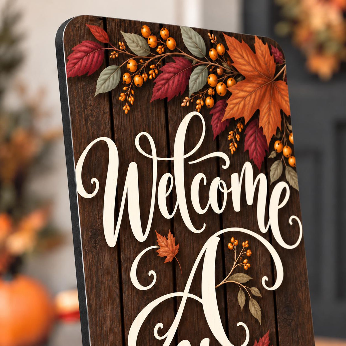 Welcome Autumn porch sign with leaves and a white pumpkin — Close-up of printed artwork. Printed wood-look artwork on aluminum.