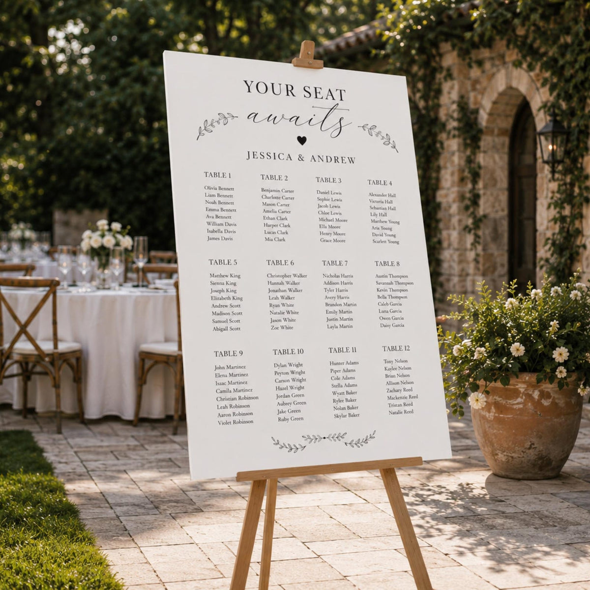 Botanical wedding seating chart with twelve tables