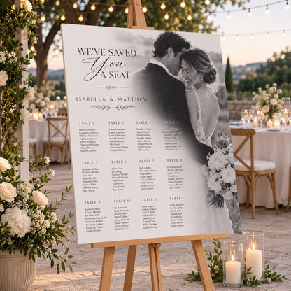 Photo wedding seating chart with twelve guest tables