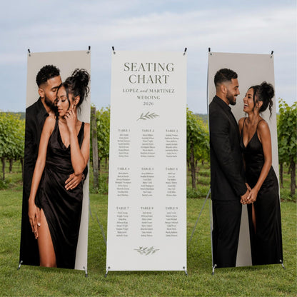 Wedding seating chart on an X-stand between two personalized couple photo banners.